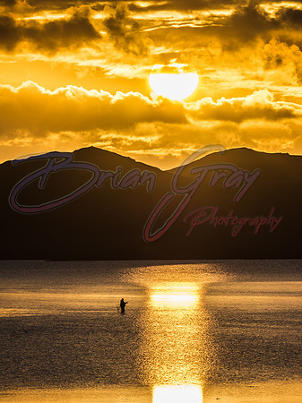 Sunset fisherman