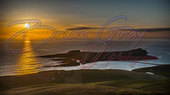 Sunset over St Ninian's Isle and Foula